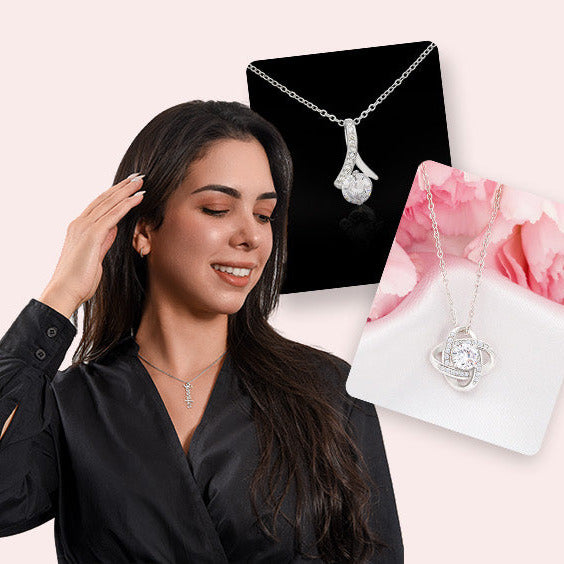 Woman with jewelry and packaging on a pink background